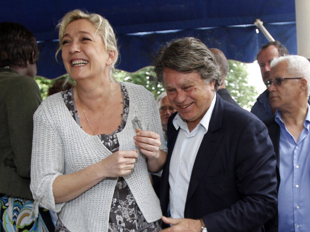 NF leader Marine Le Pen and NF candidate Gilbert Collard