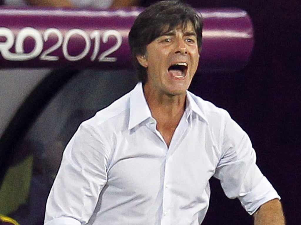 Germany's Joachim Löw reacts to his side's win over the Netherlands in which Mario Gomez scored twice