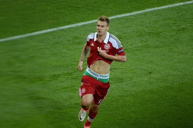 Nicklas Bendtner exposes his underwear after scoring for Denmark