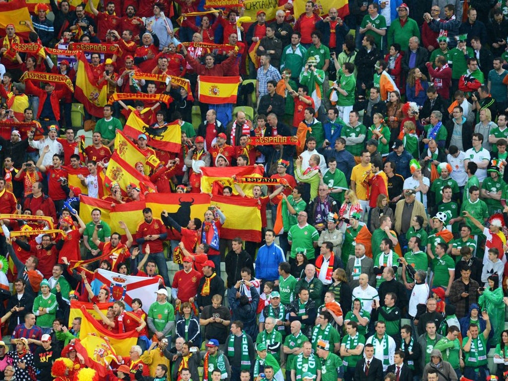 Football fans look on during the match between Spain and Ireland