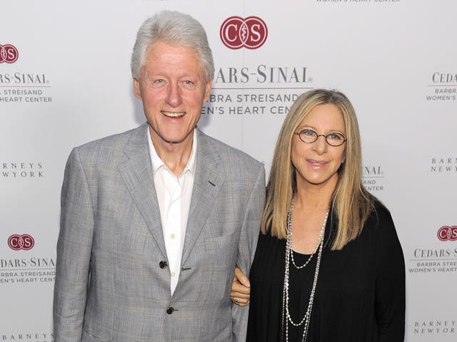 On the A-list: Bill Clinton with Streisand, who sang for him