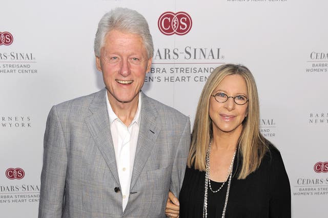 On the A-list: Bill Clinton with Streisand, who sang for him