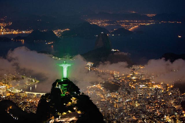 Christ the Redeemer is lit up to celebrate Rio+20