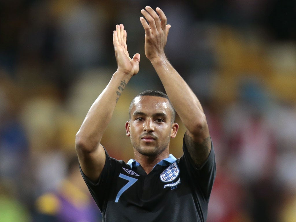 Learning curve: Theo Walcott applauds supporters after his match-winning cameo against Sweden, when he scored his fourth England goal