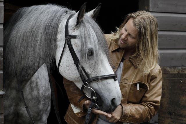 Horse Man: Rupert Isaacson developed his son's language skills in the saddle. A charity using his approach is to be launched in the UK
