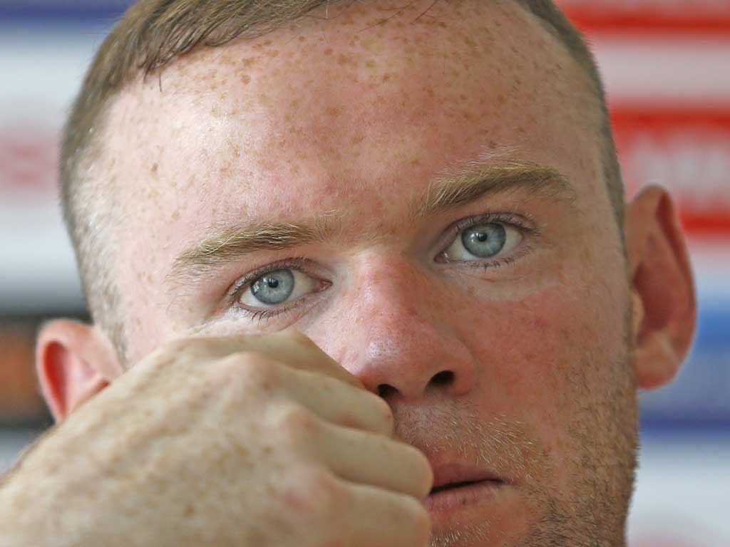 Wayne Rooney looking in pensive mood in Krakow
yesterday