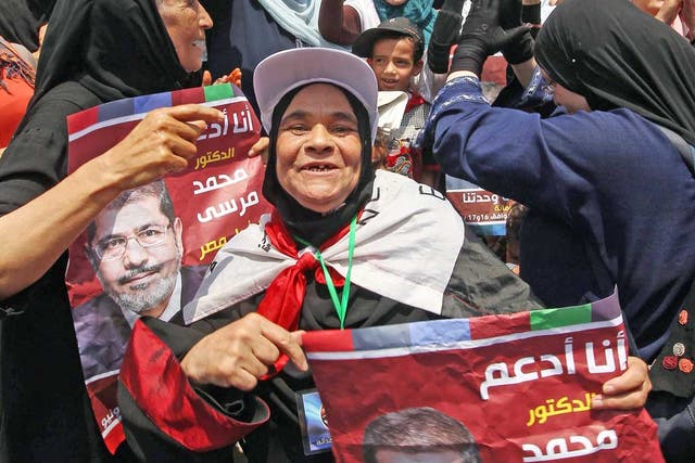 Supporters of Mohamed Morsi, the Muslim Brotherhood candidate, celebrate in Tahrir Square