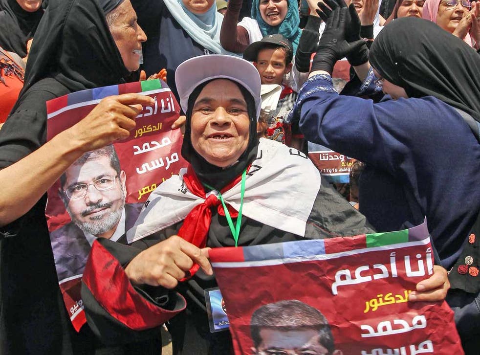 Supporters of Mohamed Morsi, the Muslim Brotherhood candidate, celebrate in Tahrir Square