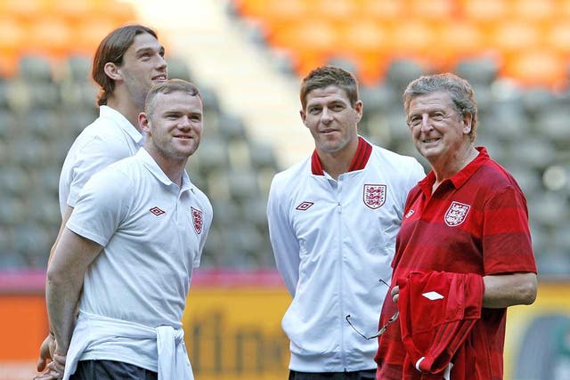 England manager Roy Hodgson with (from left) Andy Carroll,
Wayne Rooney and Steve Gerrard
