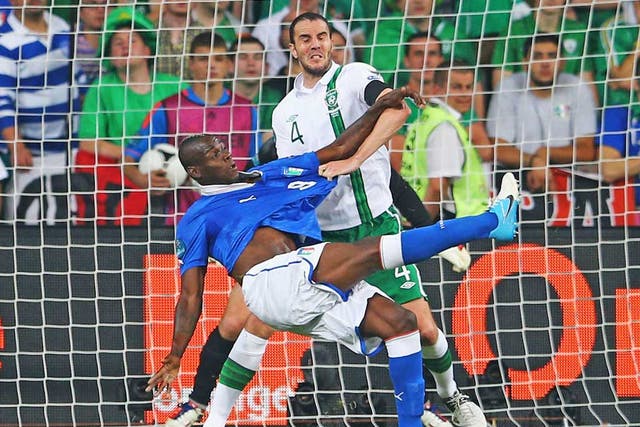 Mario Balotelli of Italy scores his second goal against Ireland