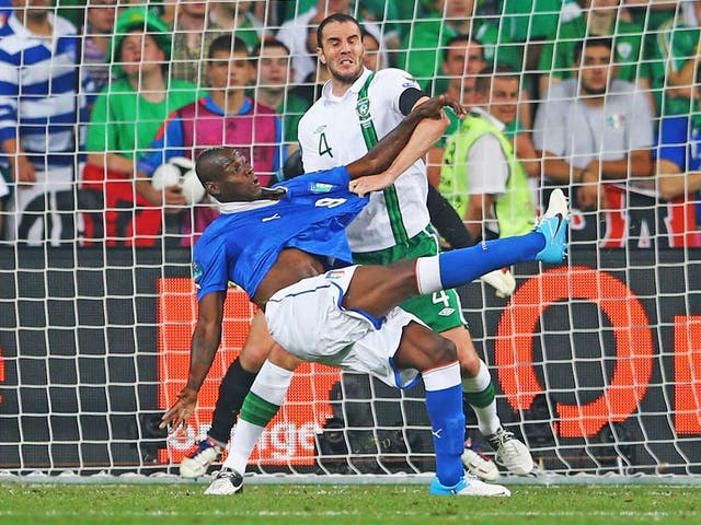 Mario Balotelli of Italy scores his second goal against Ireland