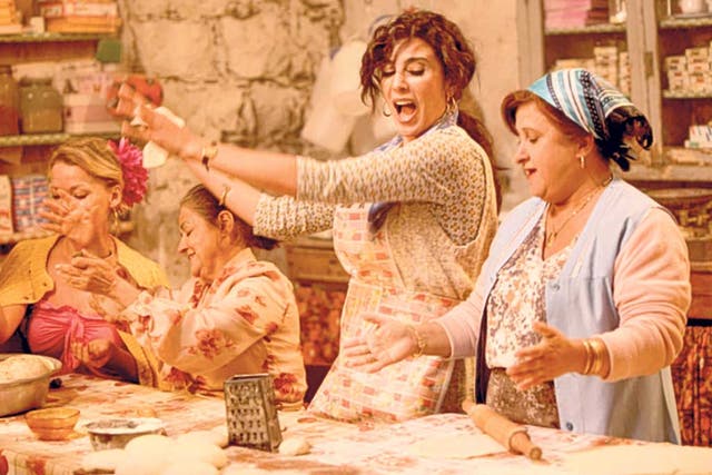 Middle Eastern promise: Nadine Labaki (centre) in
'Where Do We Go Now?' 