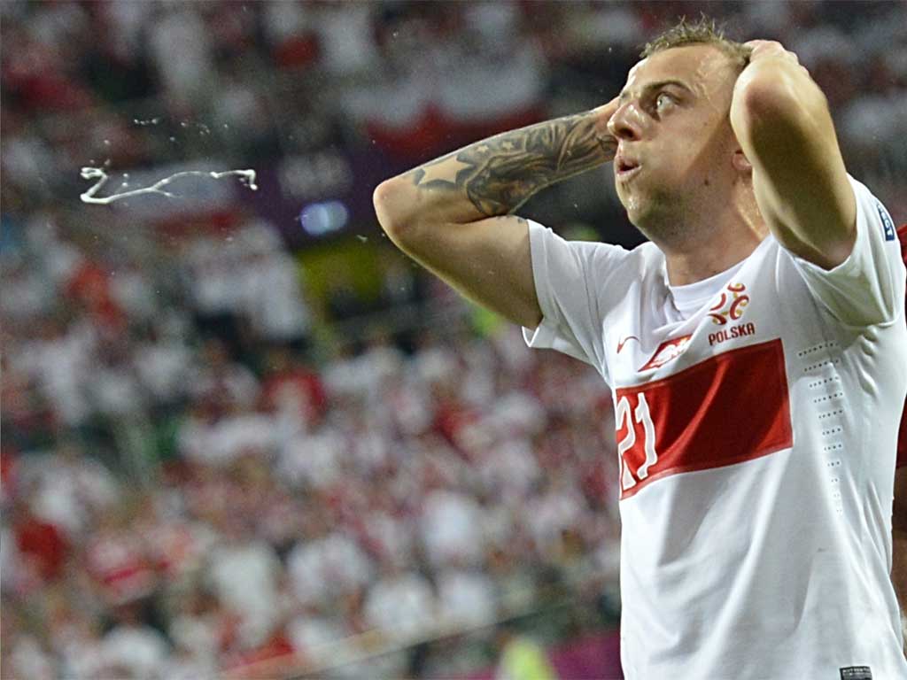Poland's Kamil Grosicki finds his country's exit from Euro 2012 hard to take