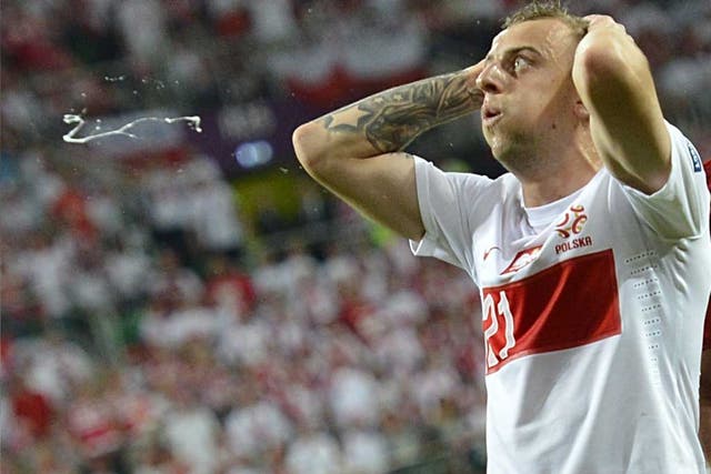 Poland's Kamil Grosicki finds his country's exit from Euro 2012 hard to take