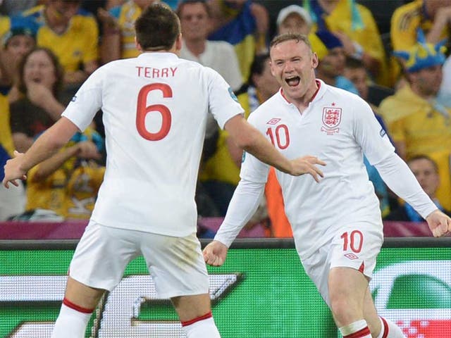 Goalscorer Wayne Rooney celebrates with John Terry