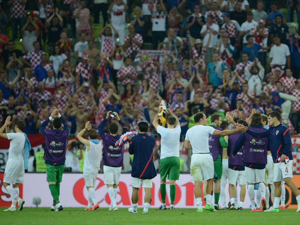 Croatia applaud their fans after exiting Euro 2012