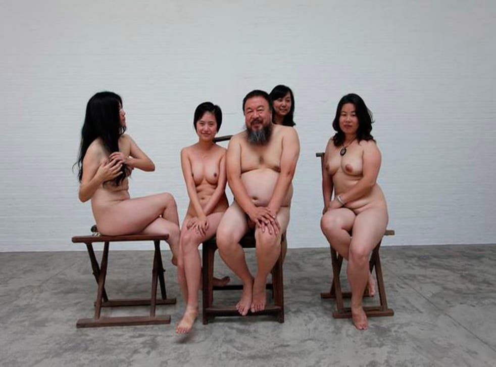 Dissident Chinese artist Ai Weiwei and four women pose naked, in this photo from November 21, 2011. Police told Ai that a file of the photograph had been opened online more than 1,000 times, and that meant he was effectively spreading pornography