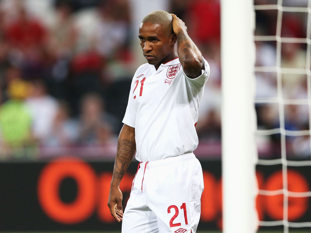 Defoe pictured during the match against France