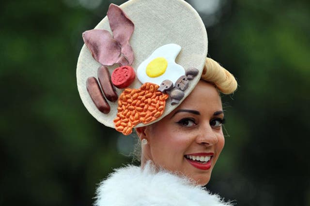 Racegoer Ebony Silk models a unique hat at Ladies' Day