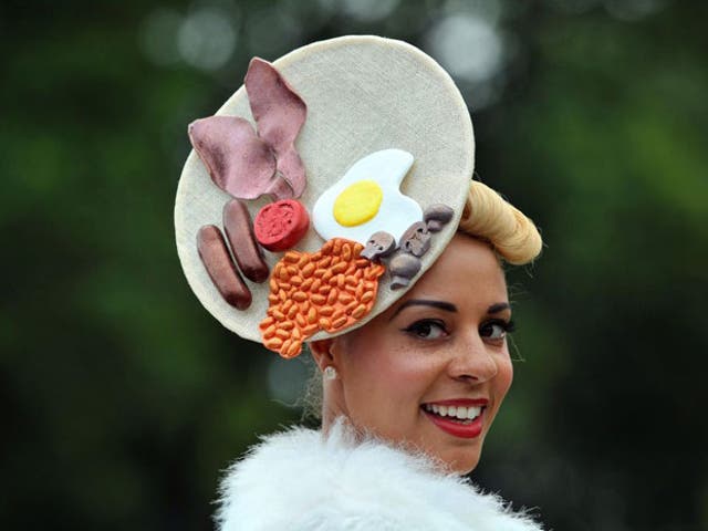 Racegoer Ebony Silk models a unique hat at Ladies' Day