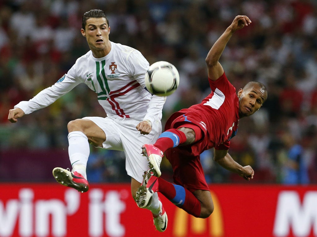 Ronaldo (left) gets the better of his marker Theodor Gebre Selassie as Portugal pushed to make the breakthrough