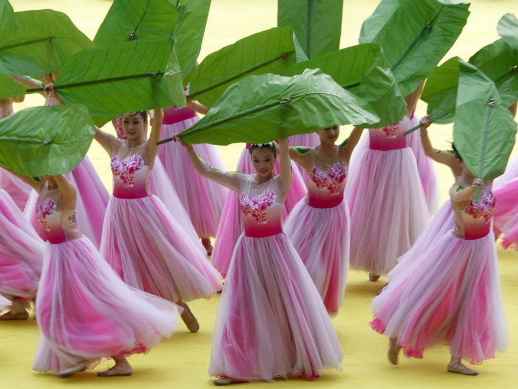 As part of the celebrations for the Duanwu festival dancers took to the stage dressed as flowers for the opening ceremony