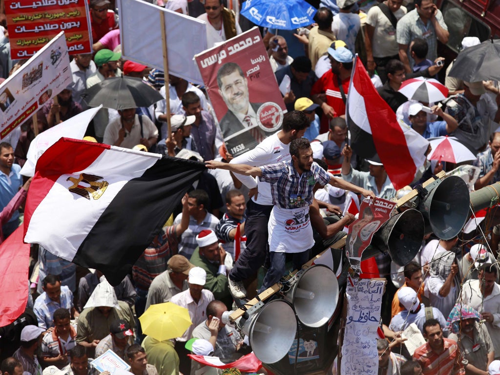 Protesters demand an election result in Tahrir Square