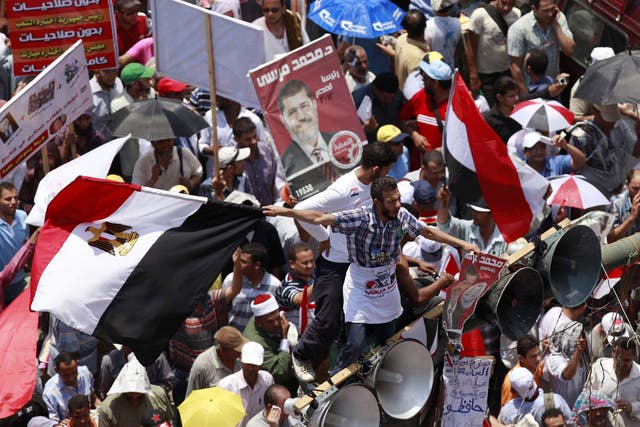 Protesters demand an election result in Tahrir Square