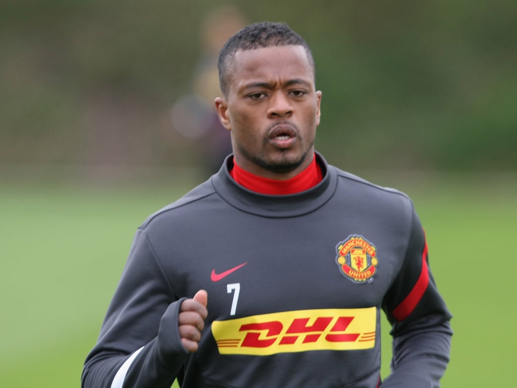 Patrice Evra of Manchester United in action during a first team training session at Carrington Training Ground in May