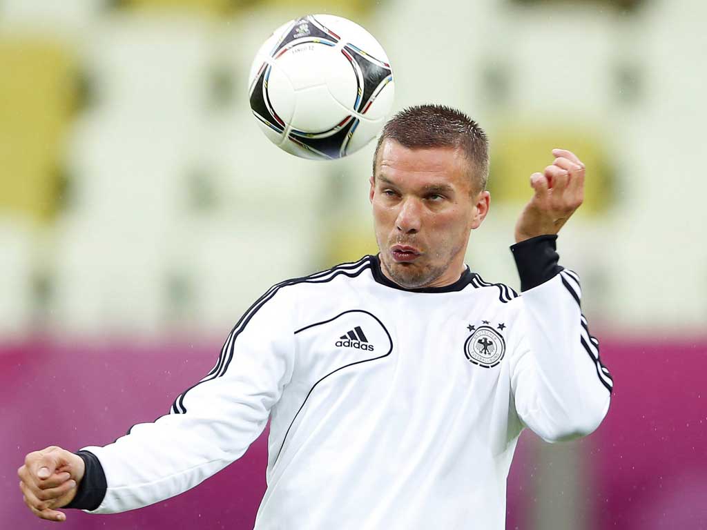 Power player: Lukas Podolski is an integral part of Germanys attack but he was sacrificed as Joachim Löw sought more pace against Greece