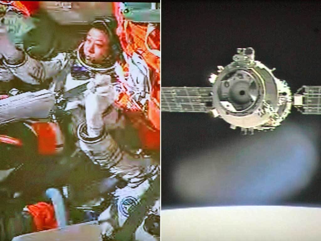 The astronauts, left, and the Shenzhou 9 spacecraft