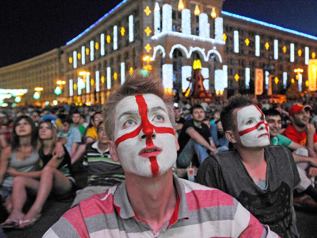 England supporters watch the drama unfold in Kiev’s fan zone last
night