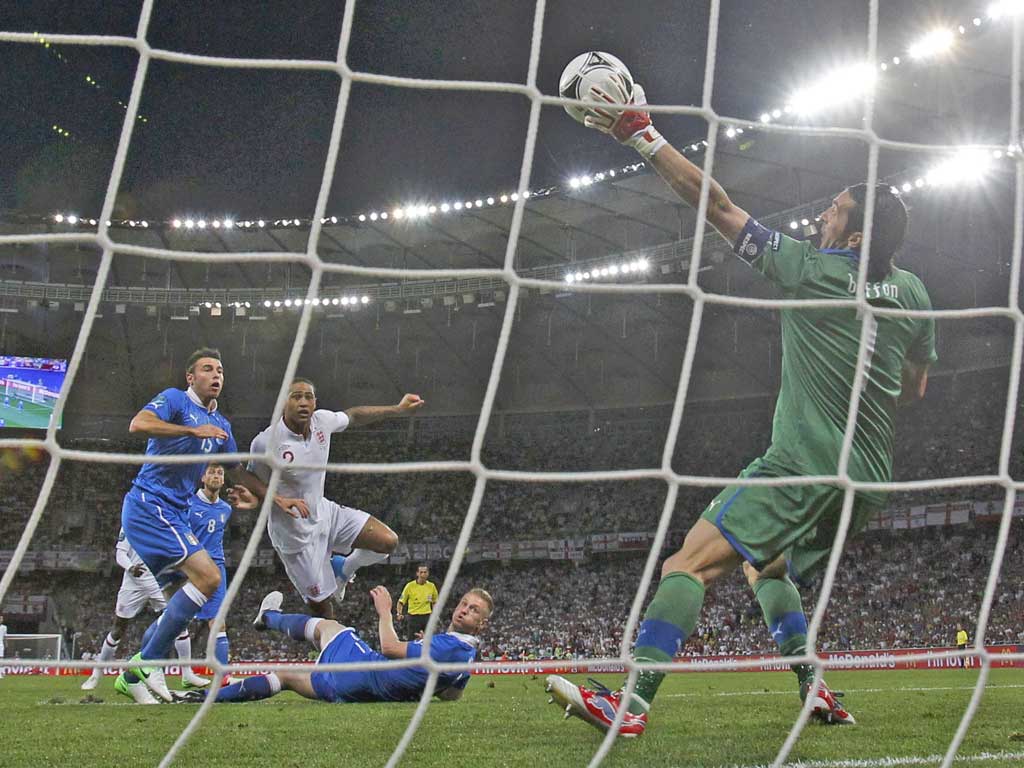 Gianluigi Buffon produces an excellent save to keep out Glen Johnson’s early chance