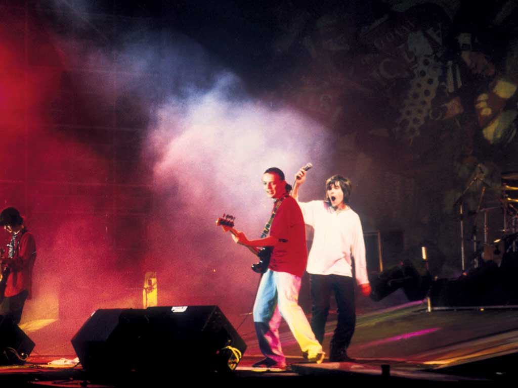 Mad for it: The Stone Roses performing at the original Spike Island gig in 1990