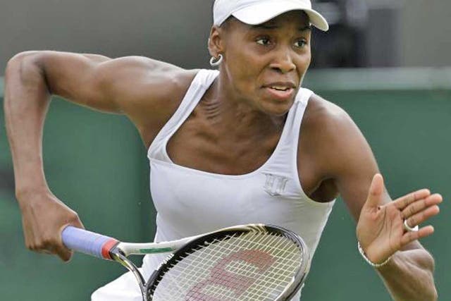 Venus Williams said she would return to
Wimbledon next year