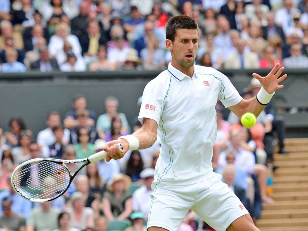 Novak Djokovic plays a return during his first-round win