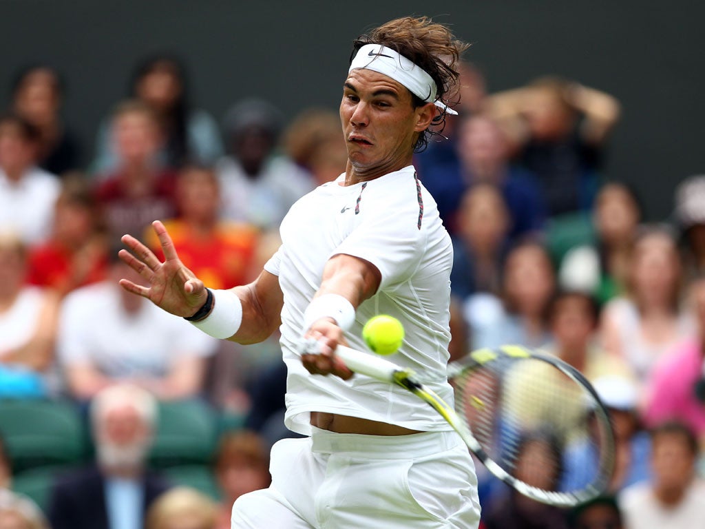 Nadal in action at Wimbledon