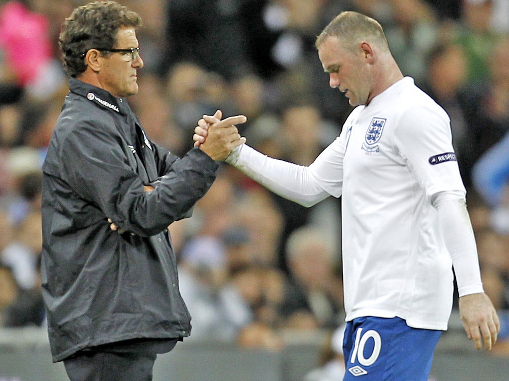 Wayne Rooney is substituted by Fabio Capello during last year's Euro Qualifier against Wales