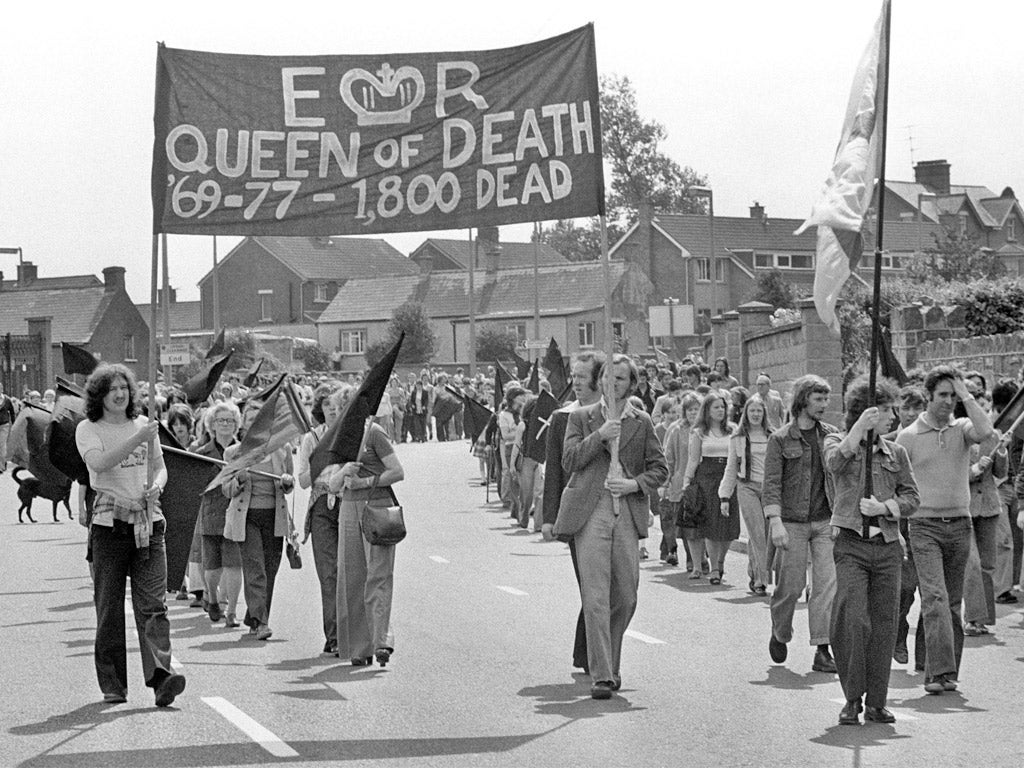 Sinn Fein protesters greet the Queen's visit to Northern Ireland in