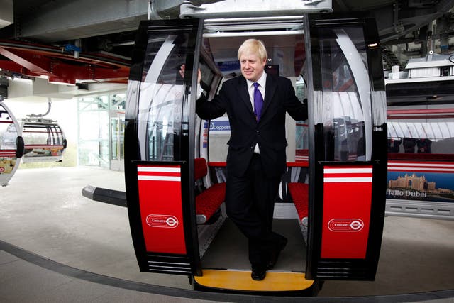 Boris Johnson, The Mayor of London, poses for a photograph at the doors of a cabin of the new Emirates Cable Car in London, Britain, 28 June 2012. The new 70 million euro London's cable car system is the first urban cable car system of its kind in Britain