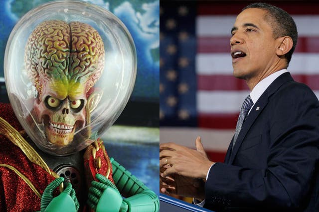 Take me to your leader: American voters were asked which American presidential candidate they thought would be better able to handle an alien onslaught. Sixty-four percent of them thought current President Obama (right) would be able to handle the likes o