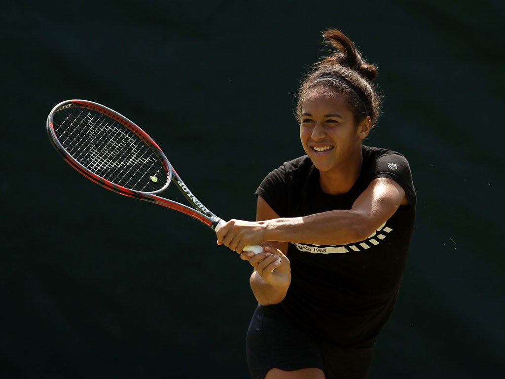 Heather Watson
practises at the
All England Club
yesterday