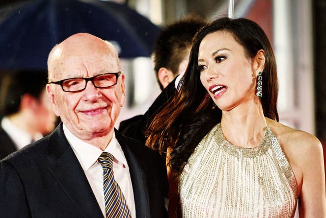 Rupert
Murdoch
with his wife,
Wendi Deng