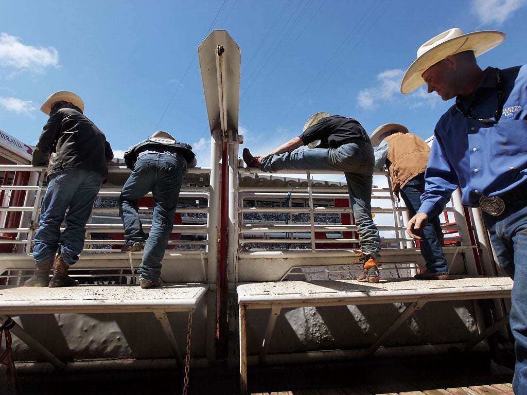 Hats off: Cowboys prepare for an event