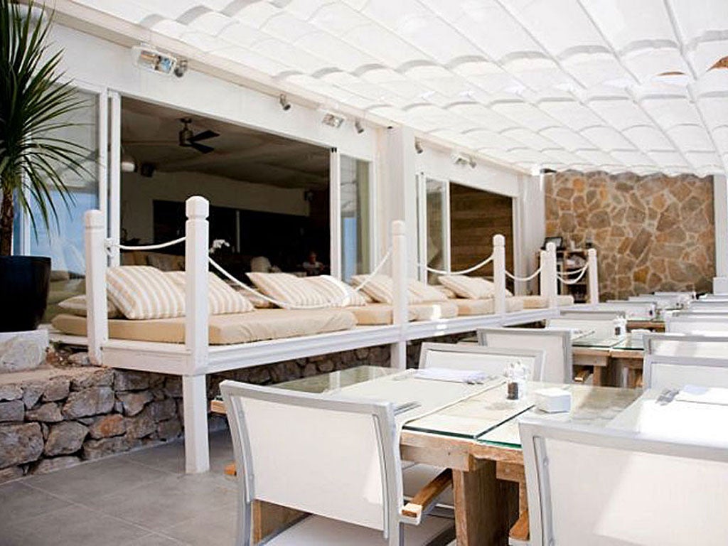 Amante, Sol d'en Serra

<p>This quiet cove just north of Ibiza Town is home to a chic new hangout that opened in April. Conceived by party-goer, promoter, and former owner of Azuli Records, Dave Piccioni, it offers yoga lessons at sunrise, a crèche for children during the day and DJs spinning chill-out music as evening falls. The raised restaurant looks out across Sol d'en Serra bay and serves fresh seafood such as char-grilled lobster, with classic champagne cocktails and martinis.</p>

<p>Amante, Sol d'en Serra, Santa Eularia (00 34 971 196 176; amanteibiza.com). Food starts at €9.80; drinks from €3.50.</p>