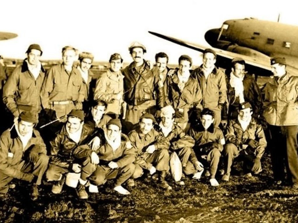 Vujnovich, far right, with a group of airmen saved by Halyard, and other OSS operatives, in 1944