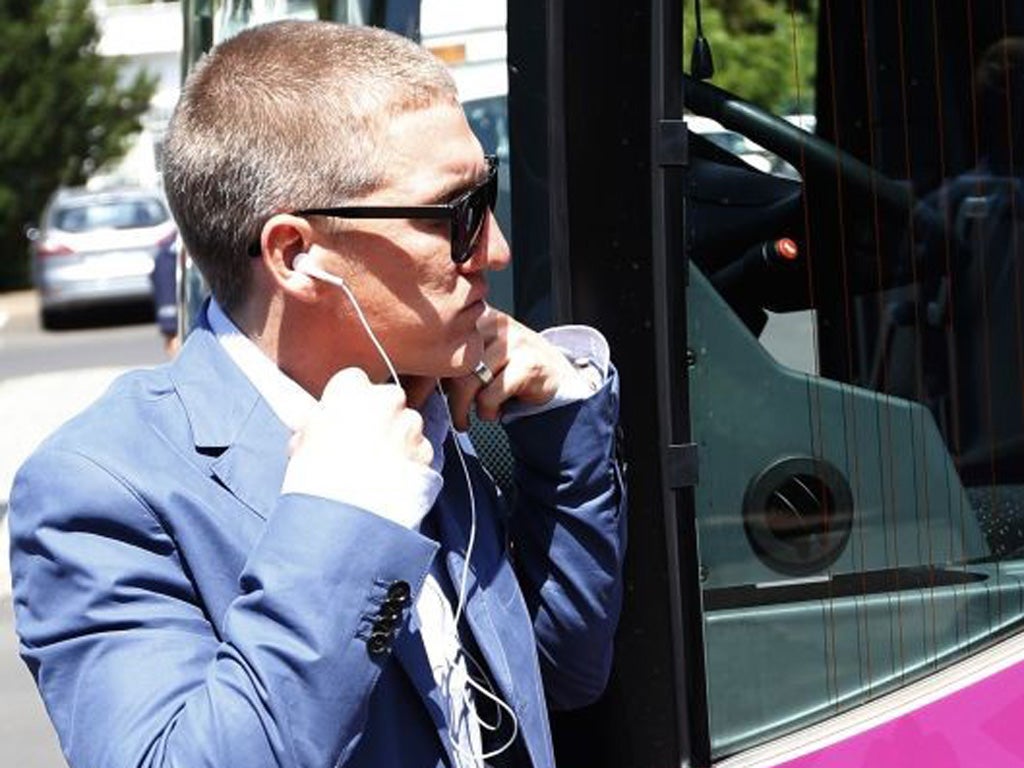 Captain Bastian Schweinsteiger arrives at Warsaw airport as the
Germans leave Poland after losing the Euro 2012 semi-final to Italy