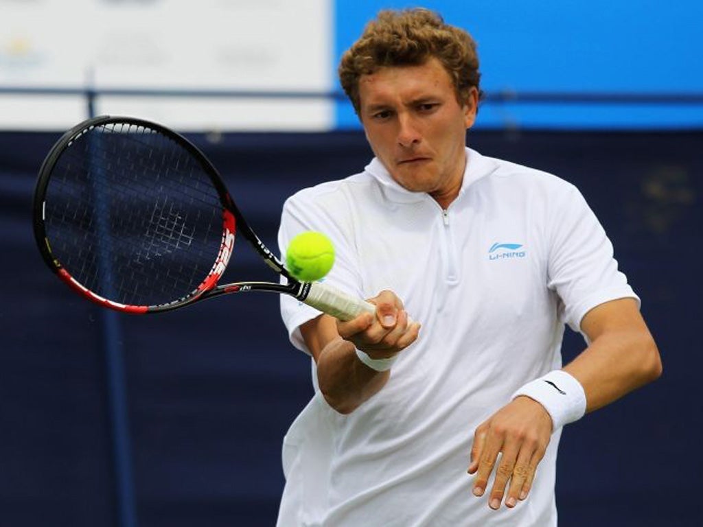 Denis Istomin is coached by his mother Klaudiya