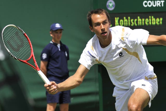 Czech mate: Lukas Rosol failed to recapture the form that saw him beat Rafa Nadal on Thursday as he lost to Philipp Kohlschreiber in straight sets