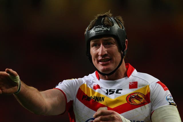 What a Dragon: Try-scorer Steve Menzies proves a handful for Wakefield